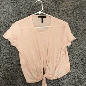 A top with hole and extra fabric for a nice bow